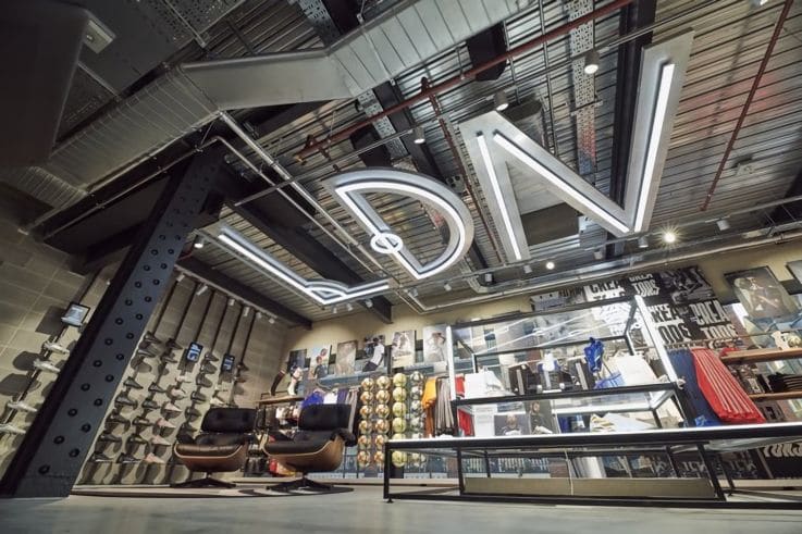 prada's 'hyper leaves' take over galeries lafayette's flagship store in  paris